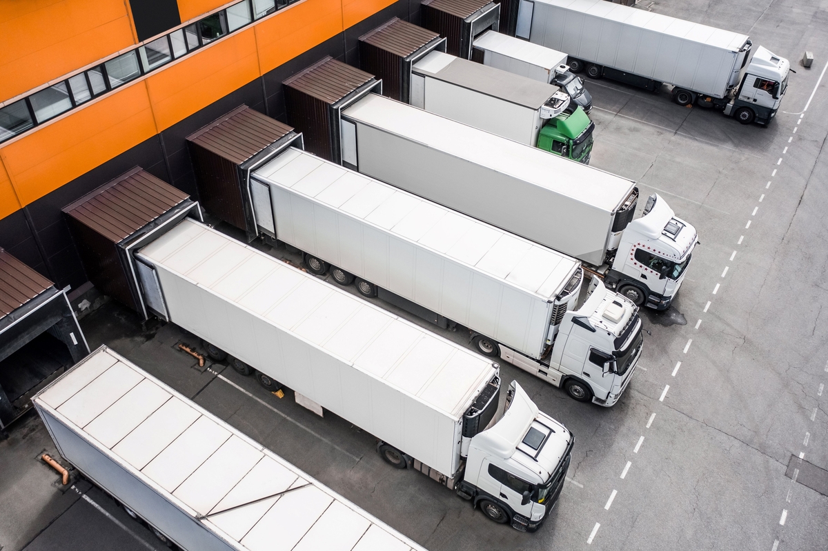 trucks-in-the-distribution-hub-2023-11-27-04-49-03-utc